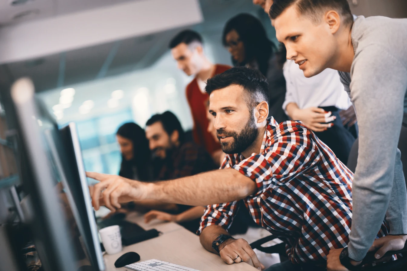 shows a group of people working together on a project